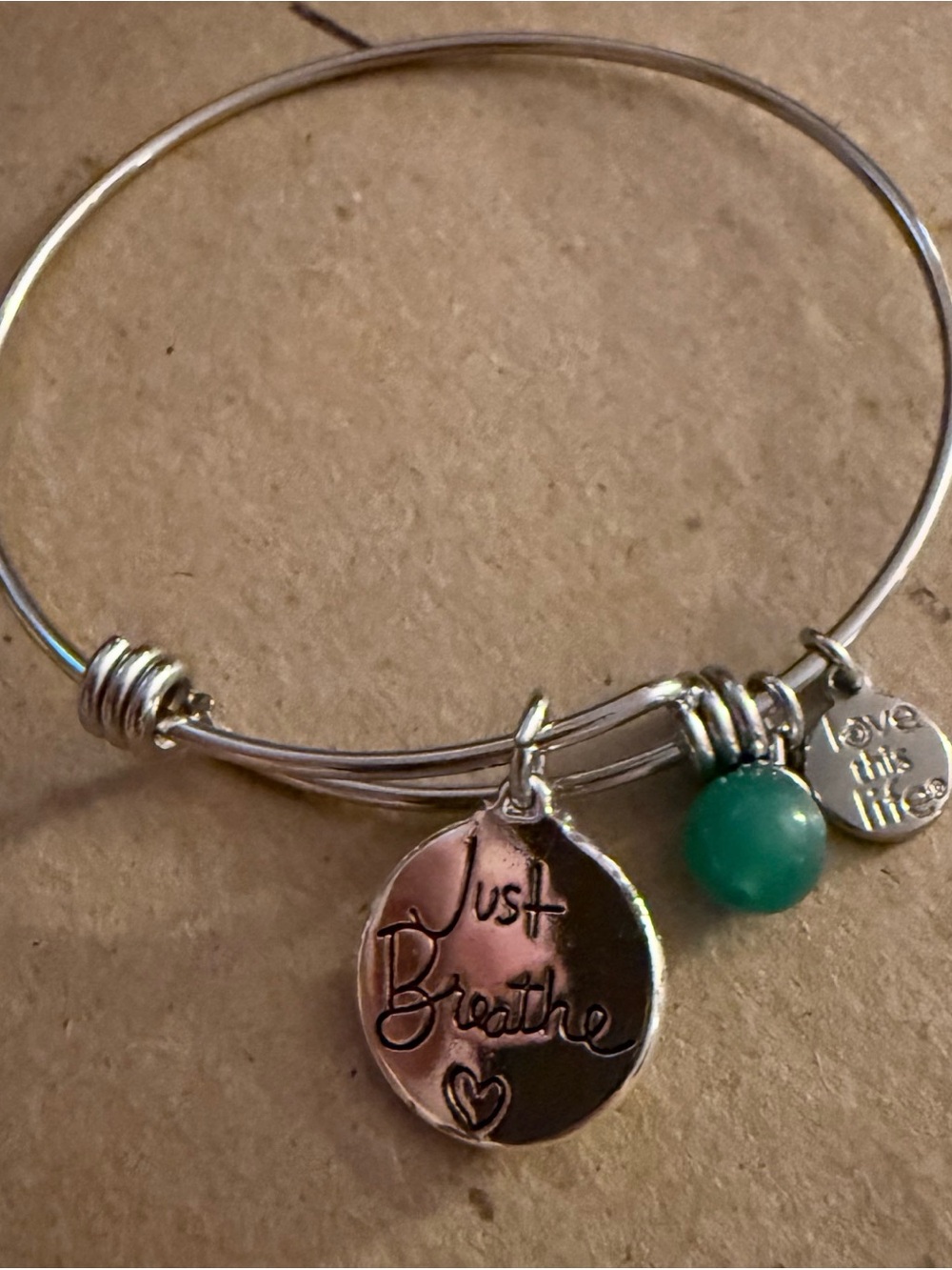 Silver 'Just Breathe' Charm Bangle with Green Accent Bead
